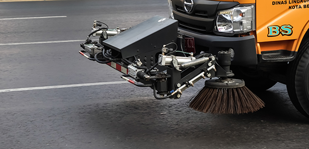 Sandsopning med maskin.