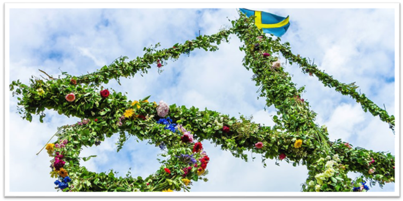 Närbild på midsommarstång