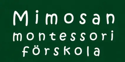 En bild på en skylt där det står mimosan montessori för skola.