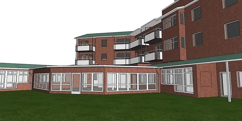 En arkitektbild av hur seniorboendet Tor kommer att se ut. En brun fasad med vita balkonger och fönster med vita karmar. 
