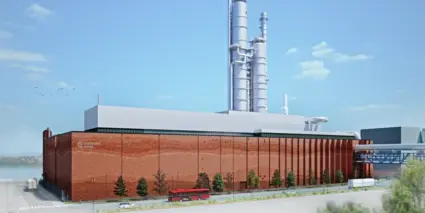 Exteriör av Stockholm exergis tegelfärgade byggnad med skorstenar i metall 