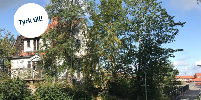 En vit villa med texten tyck till.